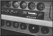 The early Series I Clenet dashboards are elegantly designed. Burlwood would be added to later models.