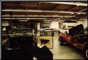 A Series II (left) and the "Designer Series" car (right) await interior work in the new Factory 3.