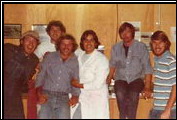 This crew built the early Clenets in the airport hangar. Alfred DiMora, in the white coat, leads the team of six.