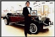 Alfred DiMora receives the Official Centennial Car Award for the Clenet at the Automotive Hall of Fame in Michigan, where the automobile was on display.